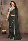Lace Embellished Georgette Saree in Dark Green