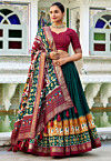 Patola Printed Tussar Silk Lehenga in Dark Green
