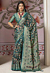 Woven Georgette Brasso Saree in Teal Blue