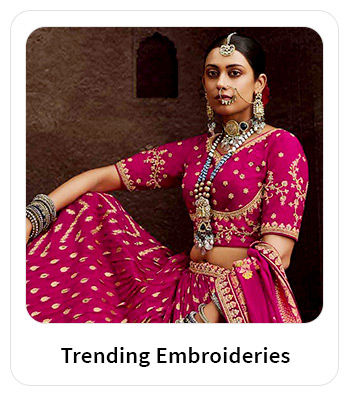 Embroidered Suits, Sarees, Top-Bottom Sets, etc., with Zari & Resham work. Shop!